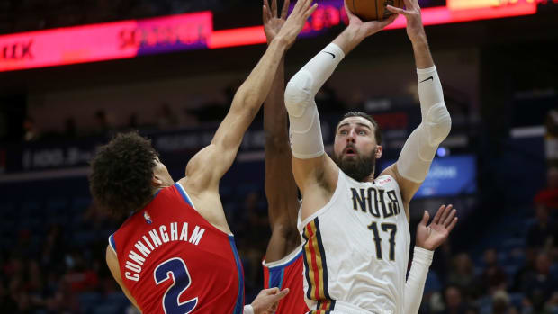 Dec 10, 2021; New Orleans, Louisiana, USA; New Orleans Pelicans center Jonas Valanciunas (17) shoots over Detroit Pistons guard Cade Cunningham (2) in the second half at the Smoothie King Center. Mandatory Credit: Chuck Cook-USA TODAY Sports